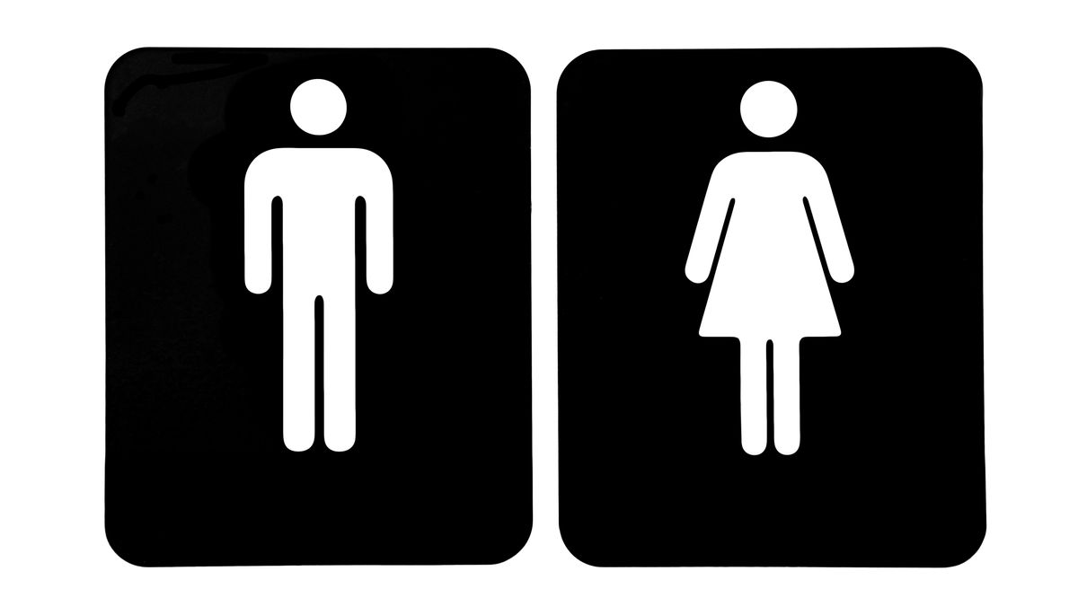 Men and women bathroom signs in silhouette in black and while
